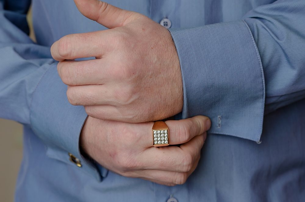 Men's signet rings are jewelry that represents heritage, family crest, and style. Learn about types of signet rings for men in silver and gold.