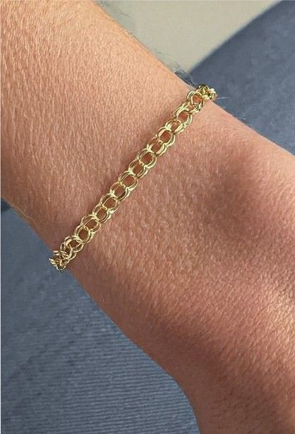 The bracelet is very nice and came in a gorgeous purple box! I have it already on my wrist.