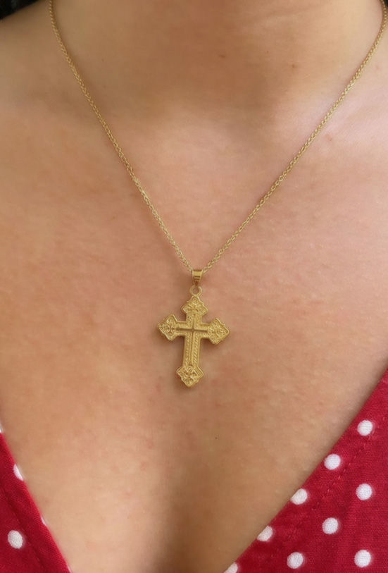 the cross is true to picture and the quality of the jewelry corresponds to the price